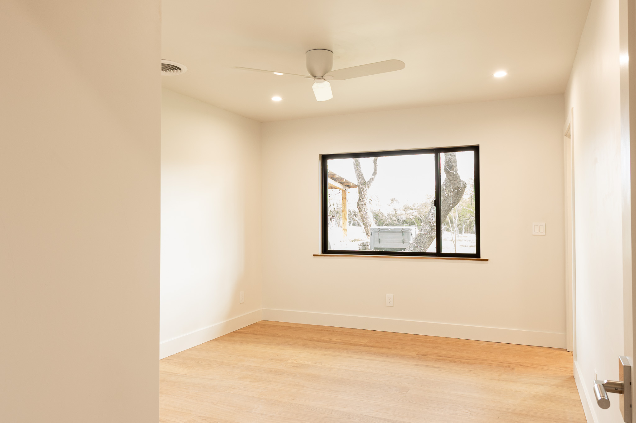 8717 South View Road Austin, TX 78737 - Photo 19 of 36 a view of a window in a room