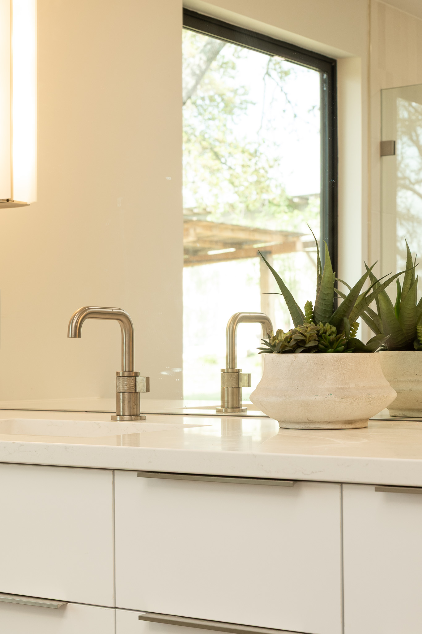 8717 South View Road Austin, TX 78737 - Photo 22 of 36 a bathroom with a sink and a window