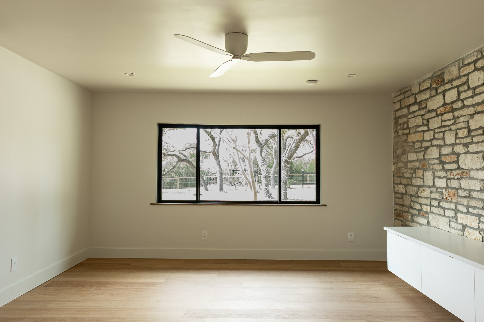 8717 South View Road Austin, TX 78737 - Photo 27 of 36 a view of a room with a large window