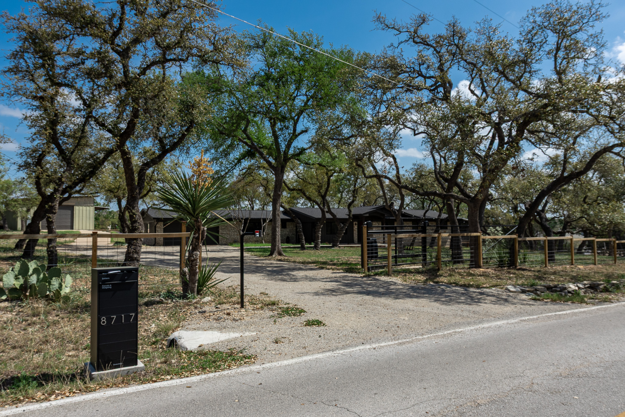 8717 South View Road Austin, TX 78737 - Photo 36 of 36 a outdoor space with lots of trees