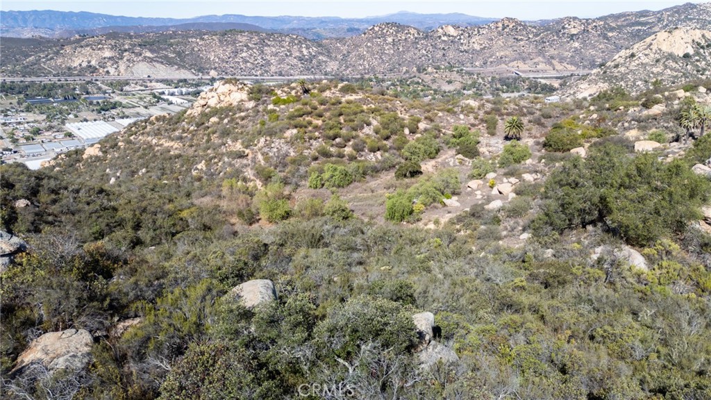 6758 Rainbow Heights Road Fallbrook, CA 92028 - Photo 2 of 5 an aerial view of residential houses with outdoor space and trees
