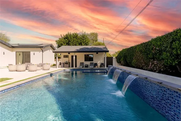 a living room with furniture and natural light