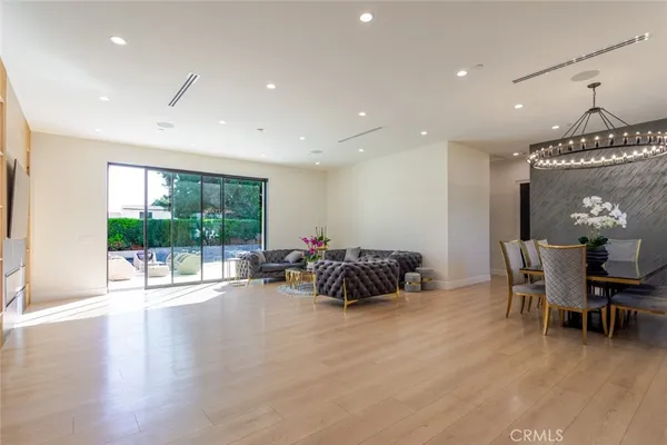a kitchen with stainless steel appliances granite countertop a stove and cabinets