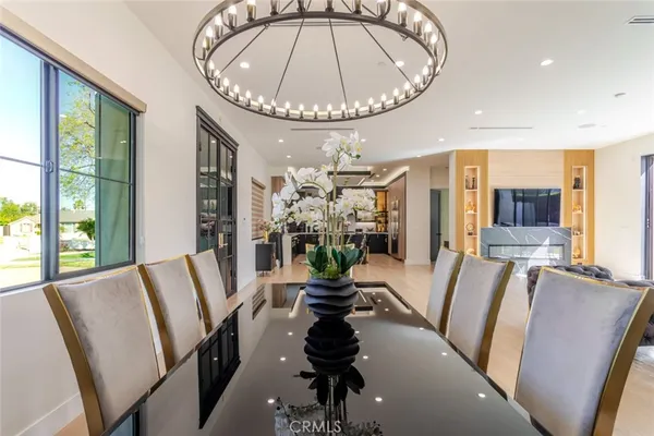 a kitchen with stainless steel appliances granite countertop a sink and cabinets