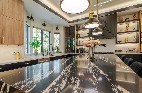 a bathroom with a granite countertop sink mirror and double