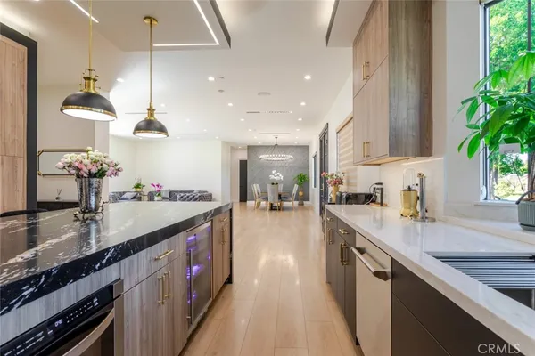 a bathroom with a double vanity sink mirror and shower