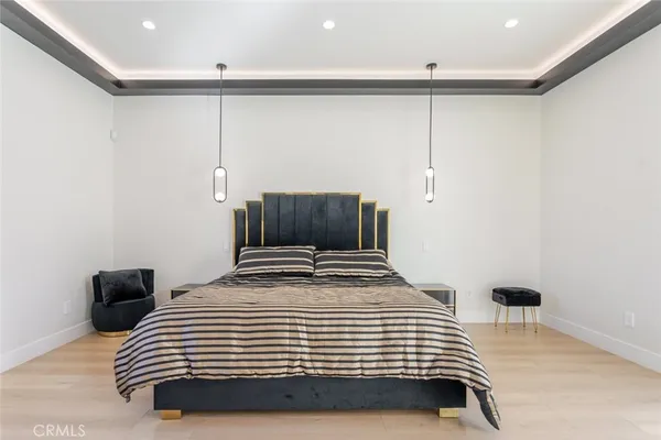 a view of a livingroom with workspace and a couch