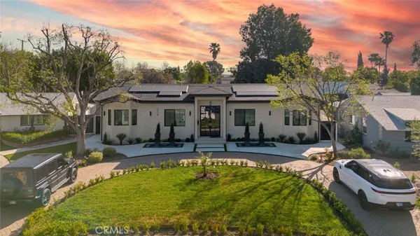 a front view of a house with swimming pool