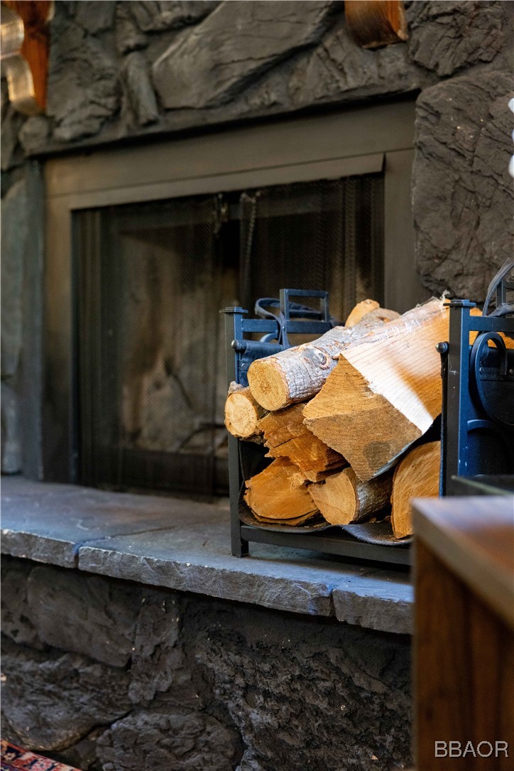 753 Maple Lane Sugarloaf, CA 92386 - Photo 18 of 50 a wooden bench sitting in front of a building