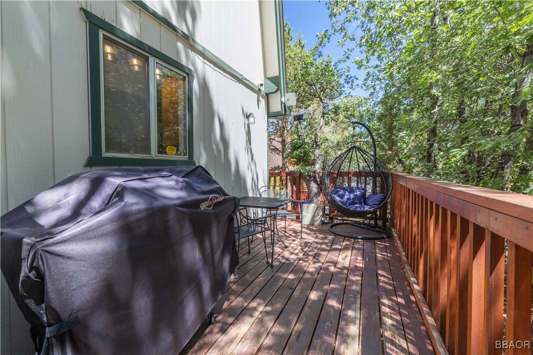 753 Maple Lane Sugarloaf, CA 92386 - Photo 44 of 50 a view of a balcony with chairs