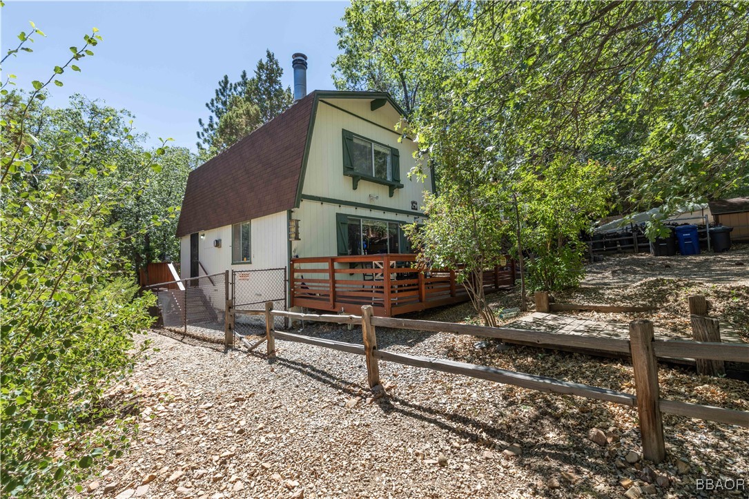 753 Maple Lane Sugarloaf, CA 92386 - Photo 9 of 50 a front view of a house with garden