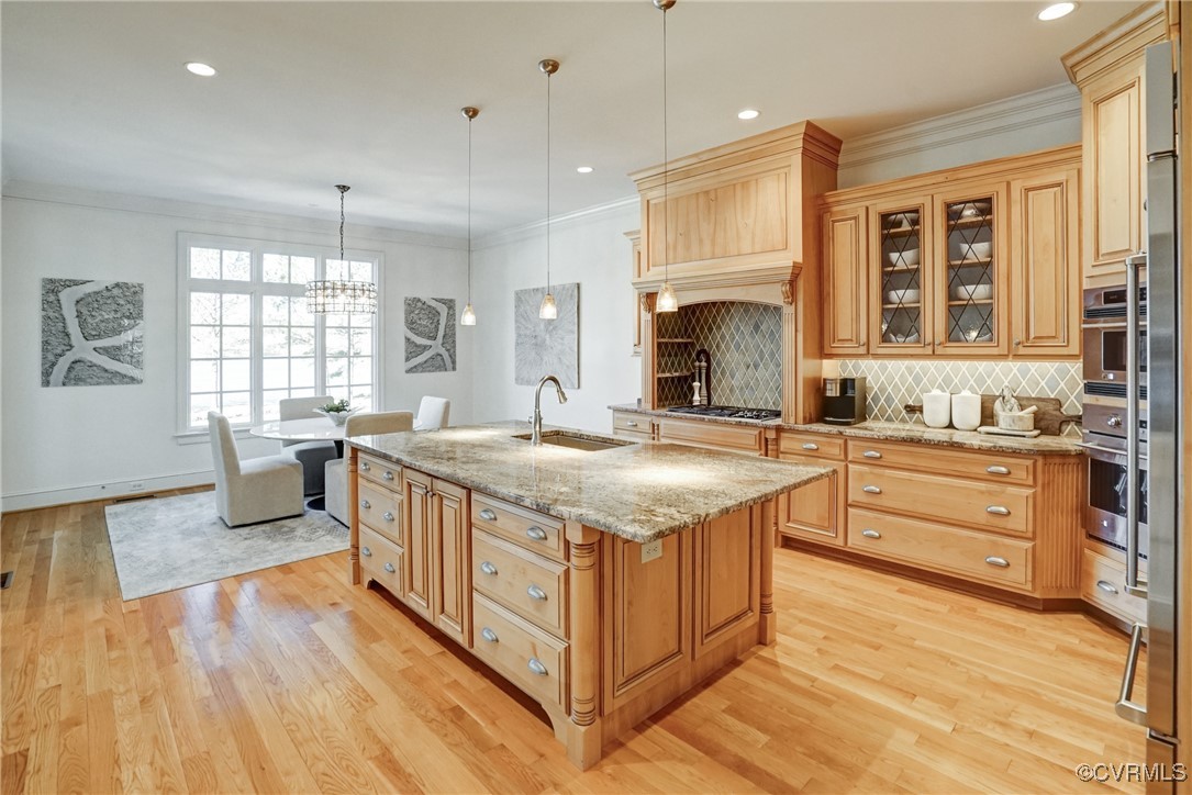 203 Kinloch Road Manakin-Sabot, VA 23103 - Photo 23 of 49 a kitchen with stainless steel appliances granite countertop a stove and a sink