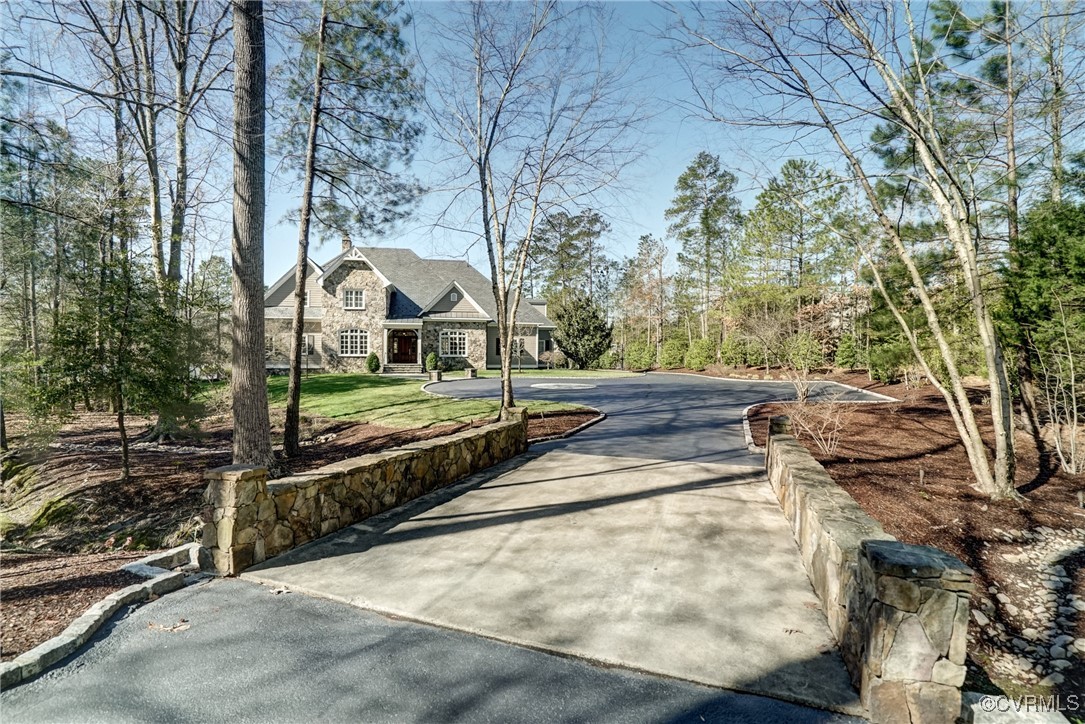 203 Kinloch Road Manakin-Sabot, VA 23103 - Photo 3 of 49 a view of backyard with wooden fence and large trees
