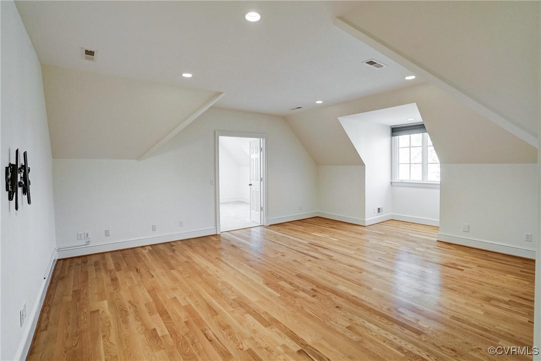 203 Kinloch Road Manakin-Sabot, VA 23103 - Photo 42 of 49 an empty room with wooden floor and windows