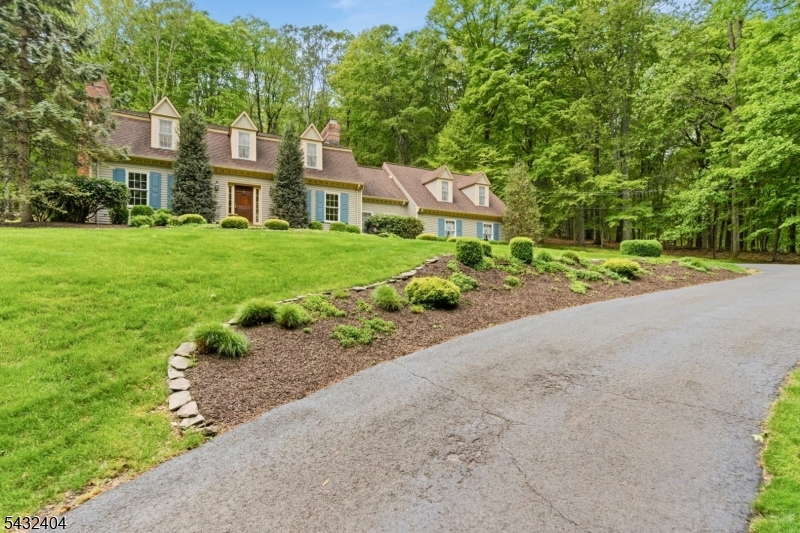 13 Hamden Road Flemington, NJ 08822 - Photo 5 of 37 a front view of a house with a yard and garage