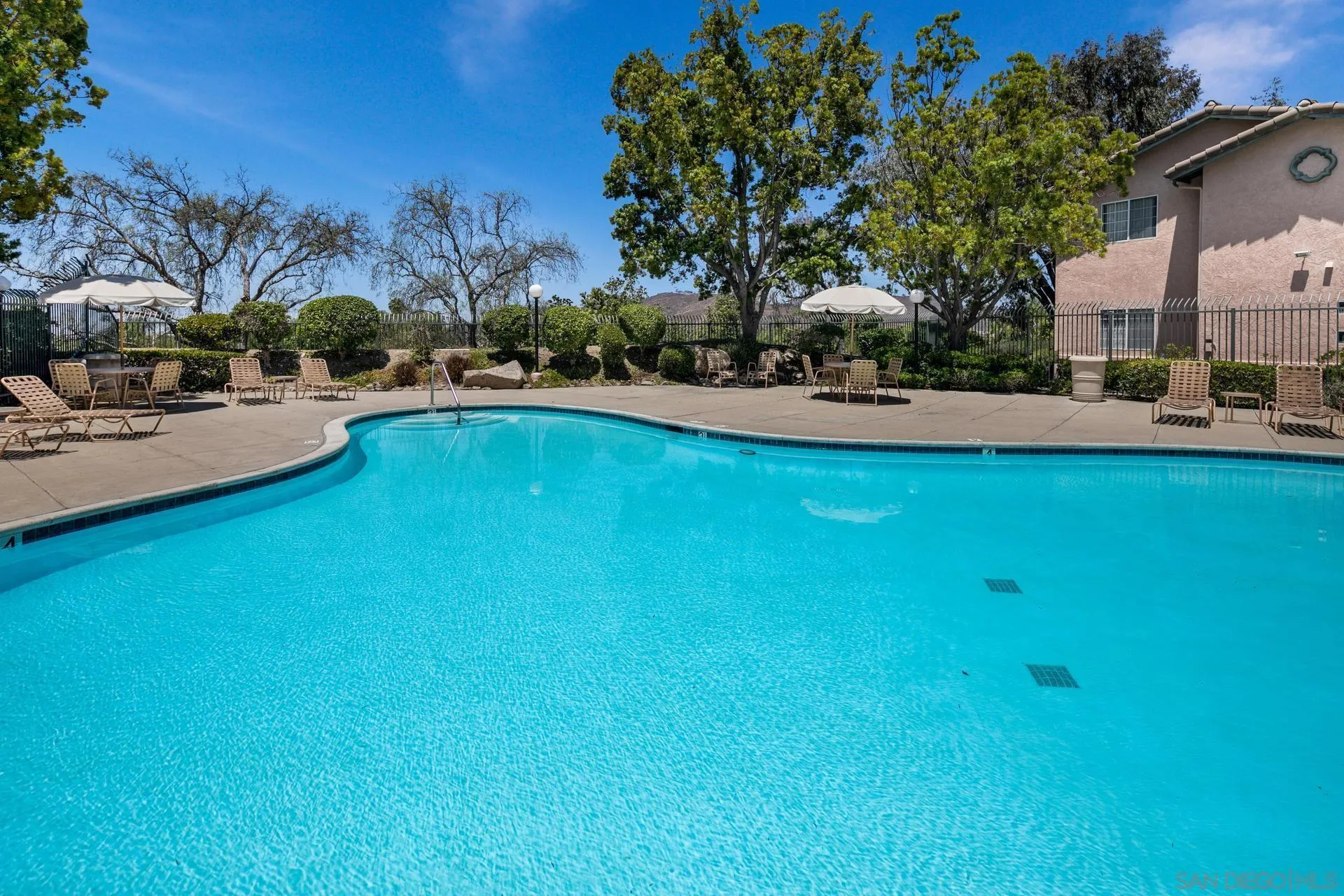 17161 Alva Road, Unit 1211 San Diego, CA 92127 - Photo 13 of 17 a view of a swimming pool and outdoor space