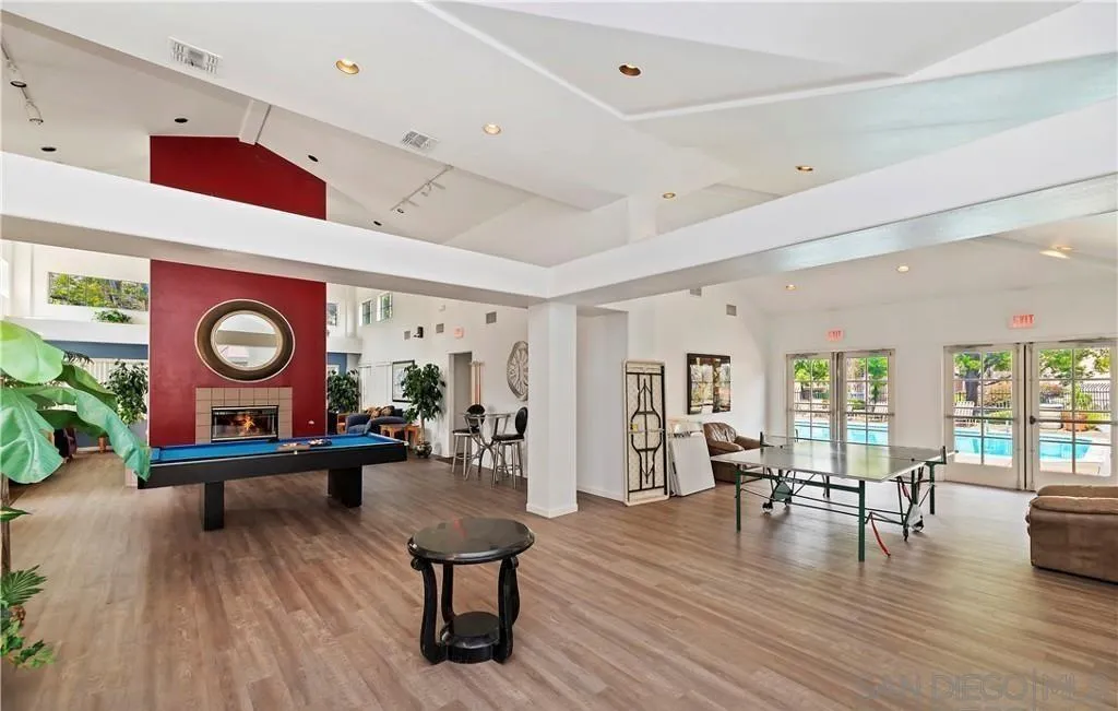 17161 Alva Road, Unit 1211 San Diego, CA 92127 - Photo 7 of 17 a living room with furniture and wooden floor