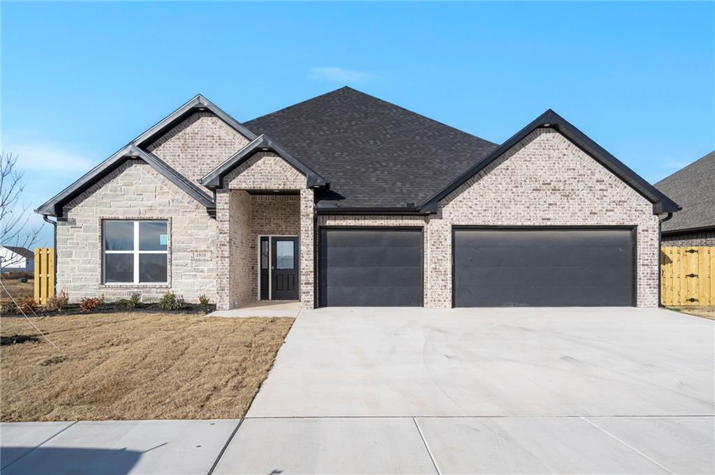 1910 Peacock Road Centerton, AR 72719 - Photo 1 of 29 Brick exterior with black trim accents