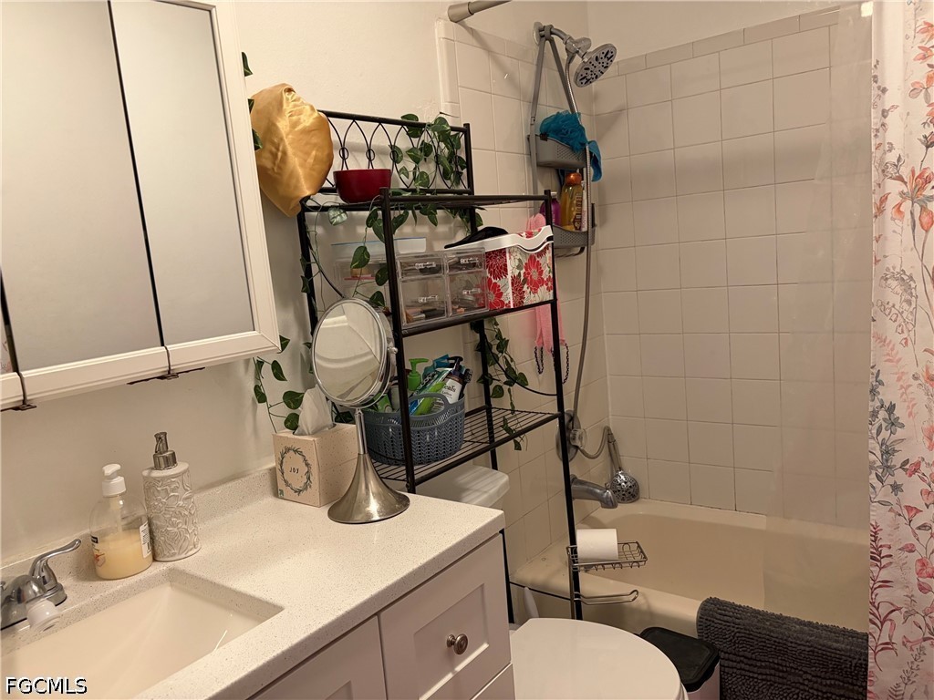 2175 Twin Brooks Road North Fort Myers, FL 33917 - Photo 9 of 27 a bathroom with a sink toilet and shower