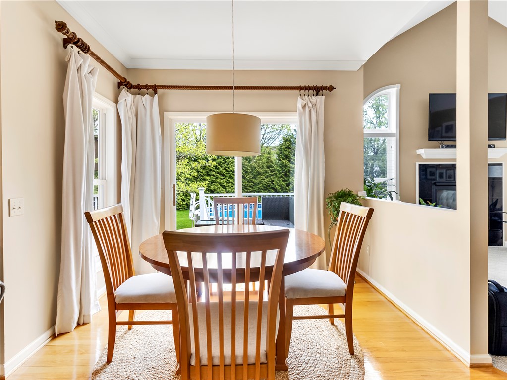 8 Claridge Circle Penfield, NY 14580 - Photo 14 of 47 Bright sunlit kitchen dining area.