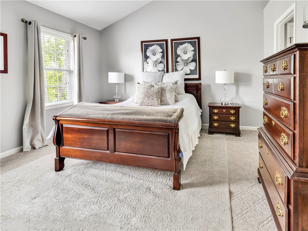 8 Claridge Circle Penfield, NY 14580 - Photo 22 of 47 Primary bedroom with volume ceiling.