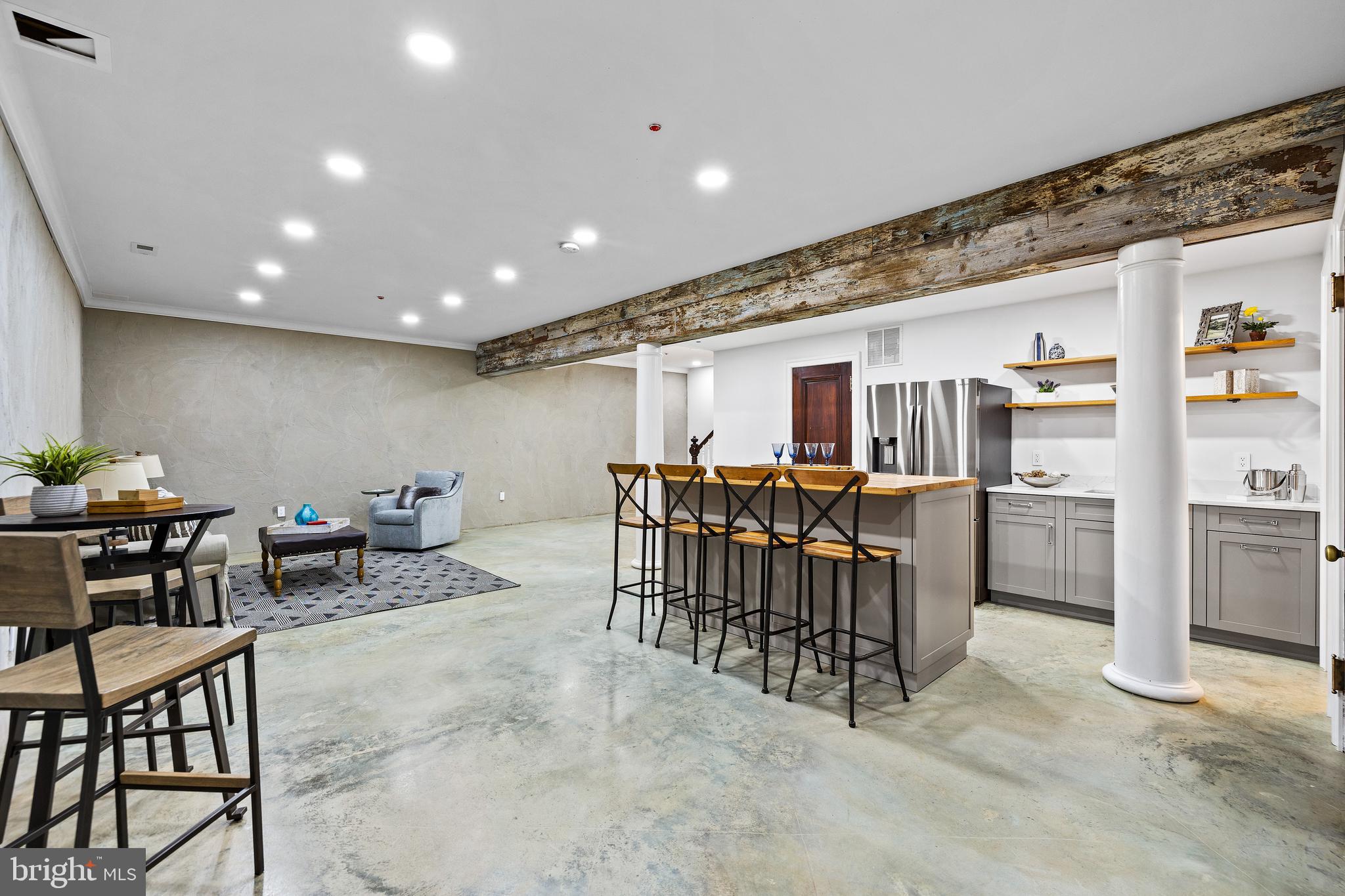 2235 Traceys Store Road Parkton, MD 21120 - Photo 48 of 65 Stained custom concrete flooring & exposed beam