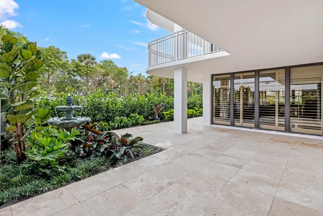 front view of a house with a garden