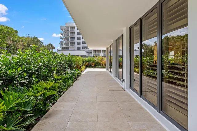 a view of a balcony with an outdoor space