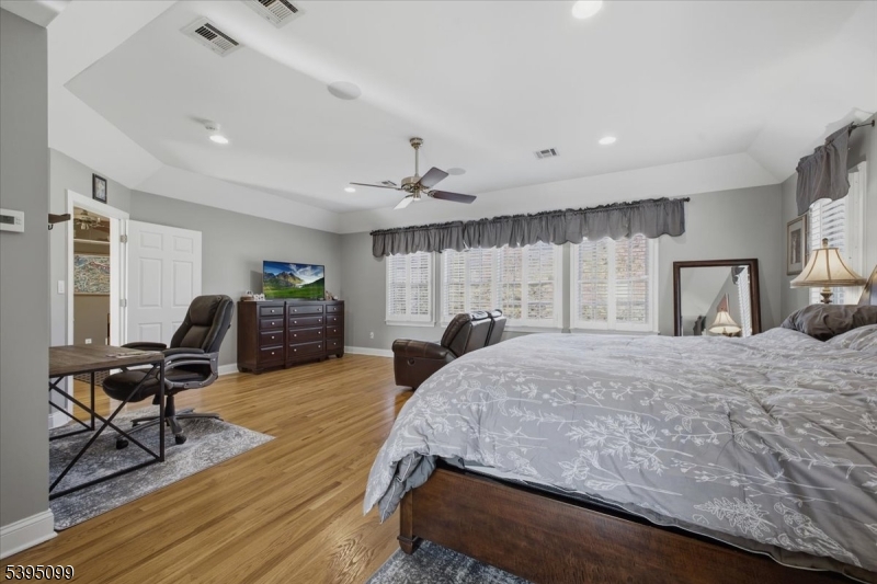 9 Doefield Road Califon, NJ 07830 - Photo 17 of 32 a bed room with a bed window and a chair