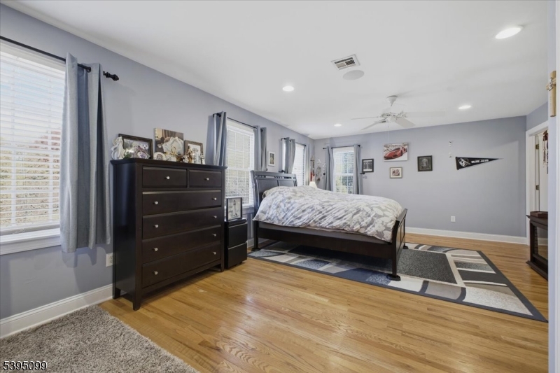9 Doefield Road Califon, NJ 07830 - Photo 22 of 32 a bedroom with a bed and a window