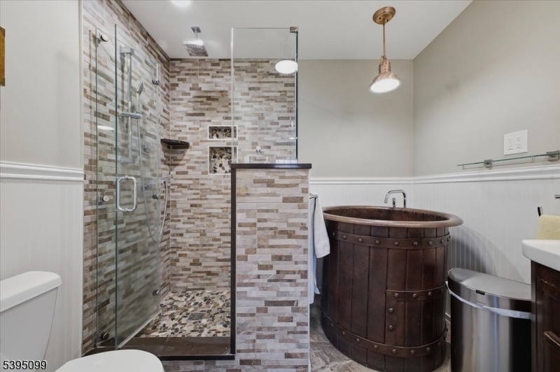 9 Doefield Road Califon, NJ 07830 - Photo 23 of 32 a bathroom with a toilet and a shower