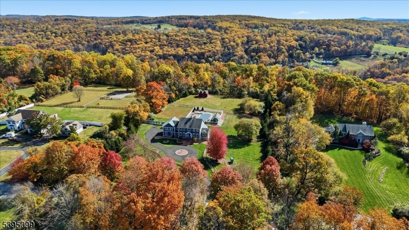 9 Doefield Road Califon, NJ 07830 - Photo 4 of 32 an aerial view of residential houses with outdoor space
