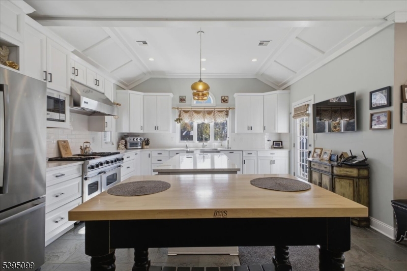 9 Doefield Road Califon, NJ 07830 - Photo 9 of 32 a kitchen with counter space and a sink in it