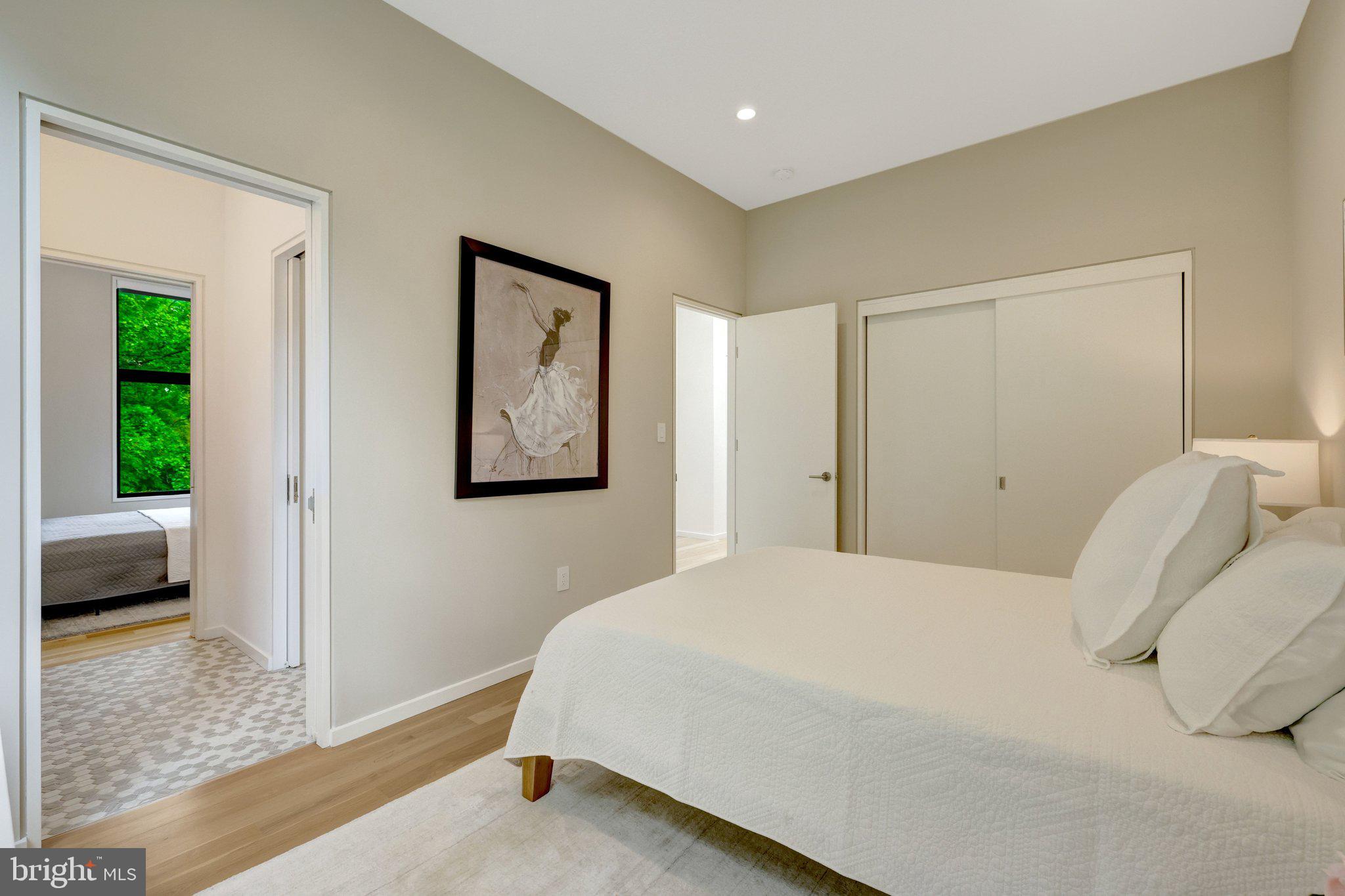 7815 Old Falls Road McLean, VA 22102 - Photo 46 of 85 Generous upper bedroom 2 with serene tree views