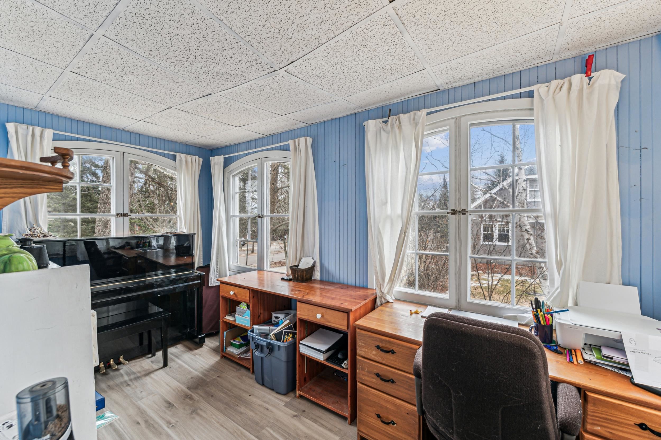 2111 Lakeview Drive Duluth, MN 55803 - Photo 11 of 21 Office area with a paneled ceiling, french doors, plenty of natural light, and light wood finished floors