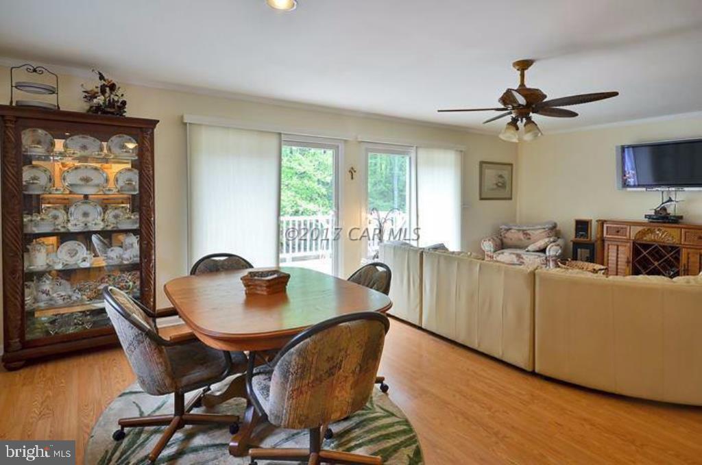12606 Balte Road Ocean City, MD 21842 - Photo 12 of 51 a dining room with furniture and window