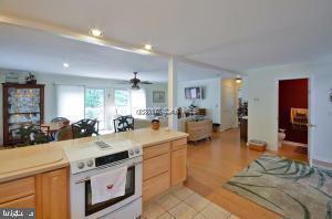 12606 Balte Road Ocean City, MD 21842 - Photo 13 of 51 a view of a kitchen and living room