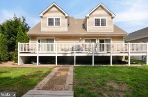 12606 Balte Road Ocean City, MD 21842 - Photo 4 of 51 a view of a house with a yard and sitting area