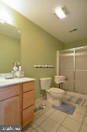 12606 Balte Road Ocean City, MD 21842 - Photo 36 of 51 a bathroom with a sink toilet and shower