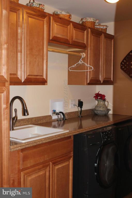 12606 Balte Road Ocean City, MD 21842 - Photo 38 of 51 a bathroom with a sink and a mirror