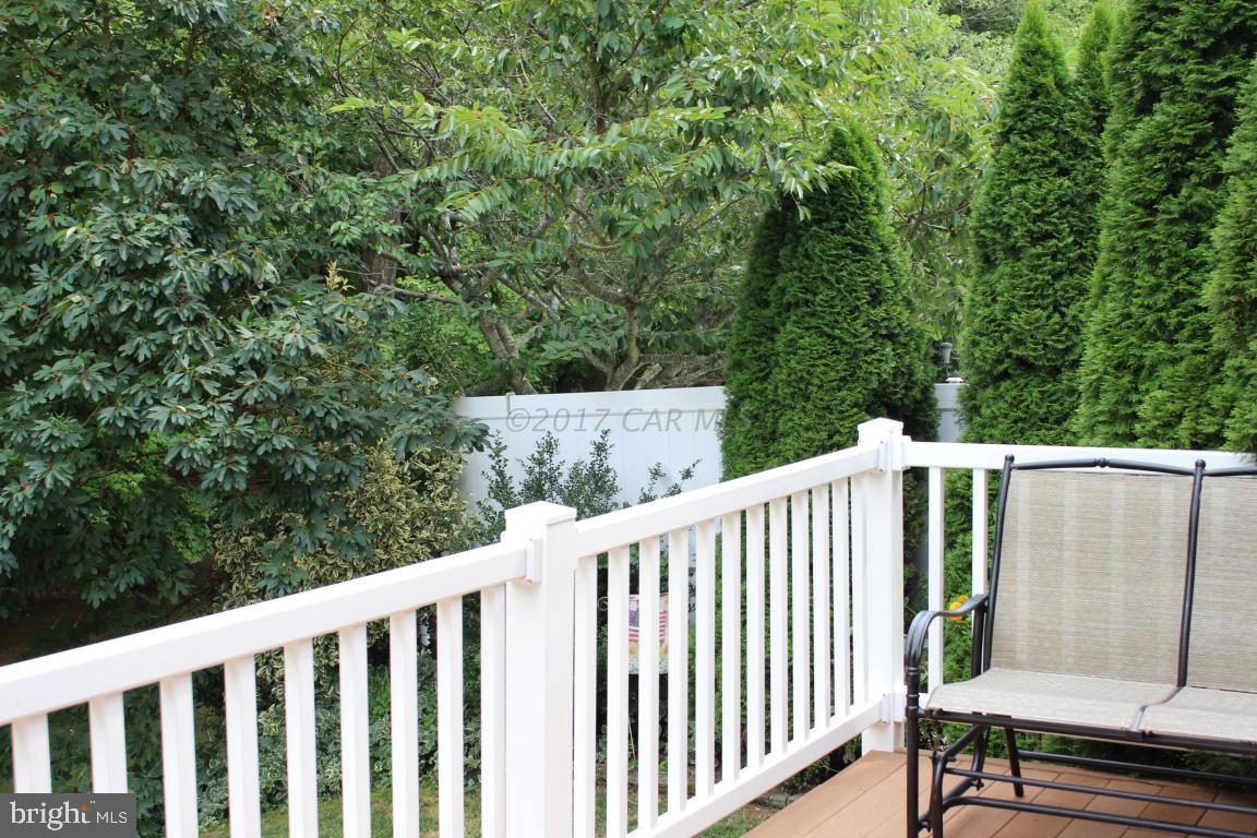 12606 Balte Road Ocean City, MD 21842 - Photo 42 of 51 a balcony with wooden floor and outdoor space