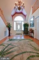 12606 Balte Road Ocean City, MD 21842 - Photo 7 of 51 a view of a entryway door front of house