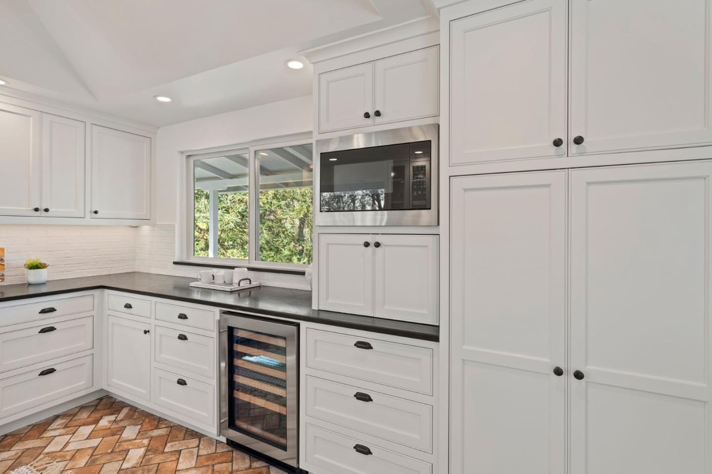 3368 Johnson Road Lafayette, CA 94549 - Photo 11 of 50 a kitchen with white cabinets and window