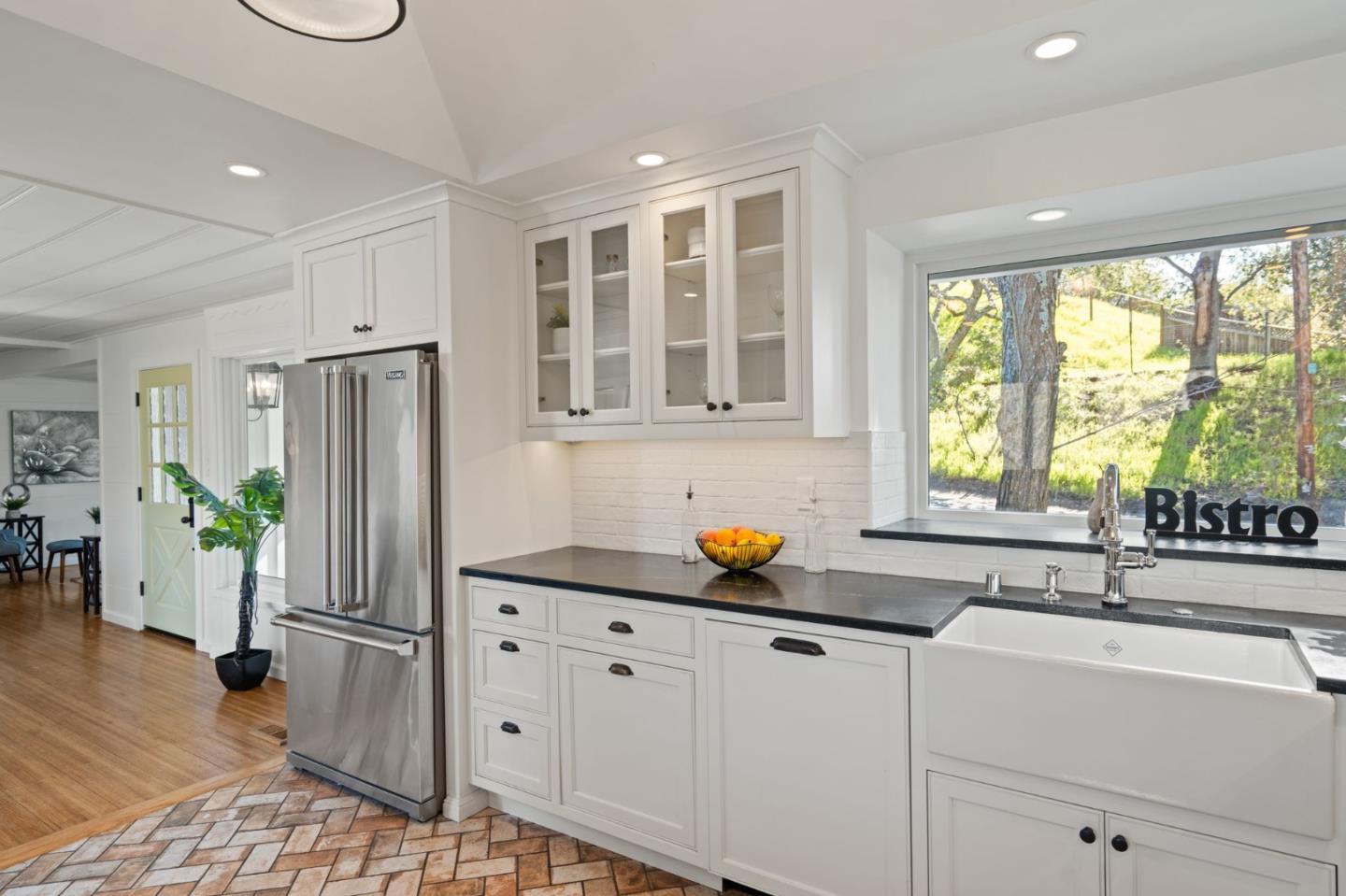 3368 Johnson Road Lafayette, CA 94549 - Photo 12 of 50 a kitchen with stainless steel appliances a refrigerator sink and cabinets