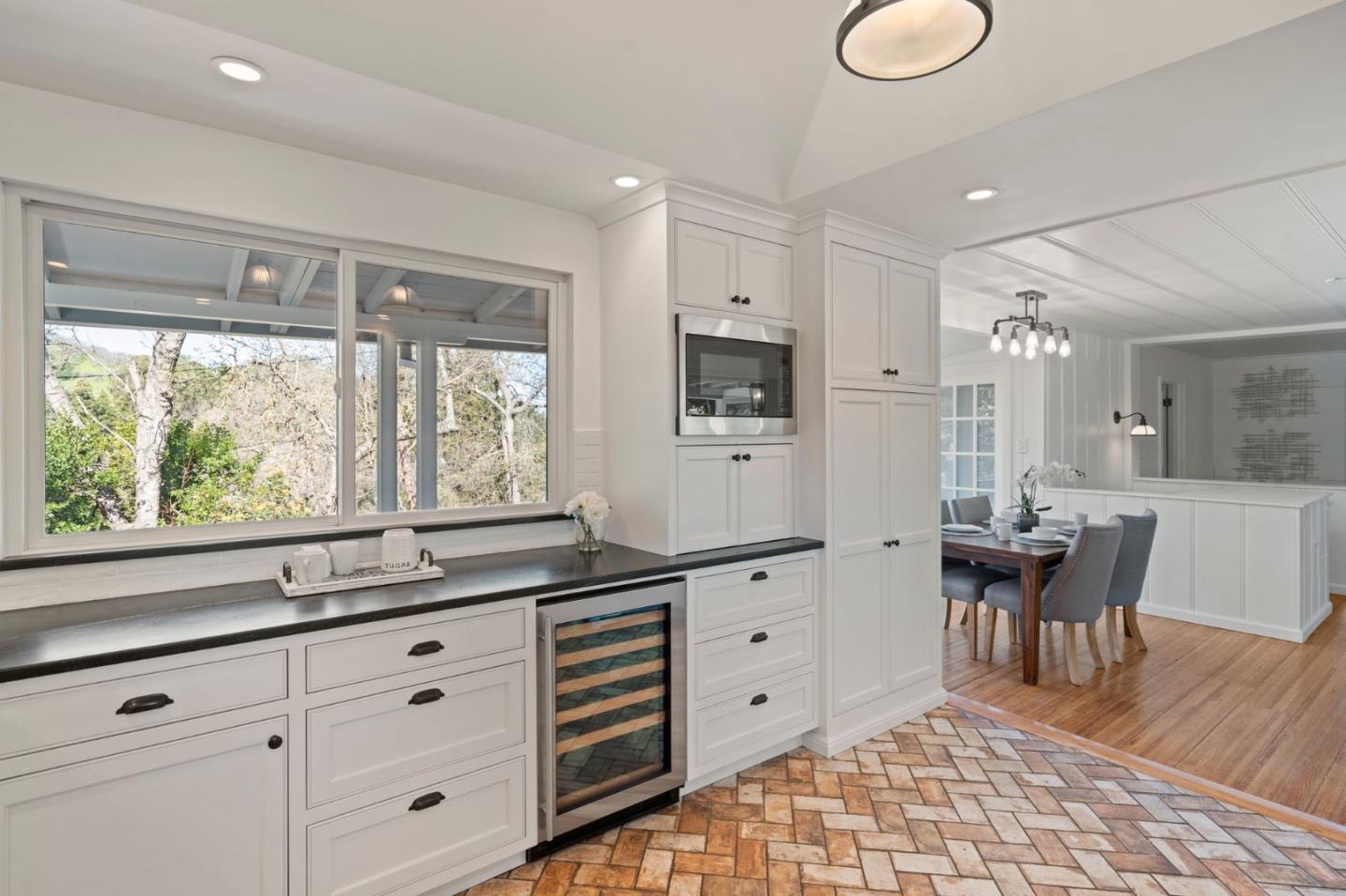 3368 Johnson Road Lafayette, CA 94549 - Photo 13 of 50 a kitchen with granite countertop a sink cabinets and wooden floor