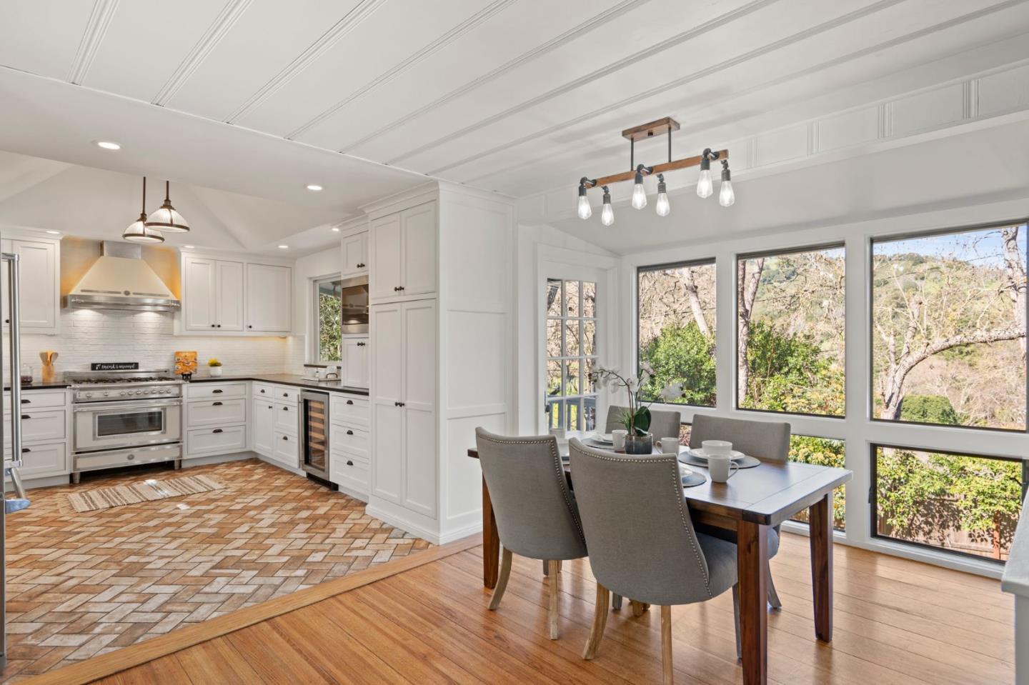 3368 Johnson Road Lafayette, CA 94549 - Photo 14 of 50 a kitchen with a table chairs wooden floors and view living room