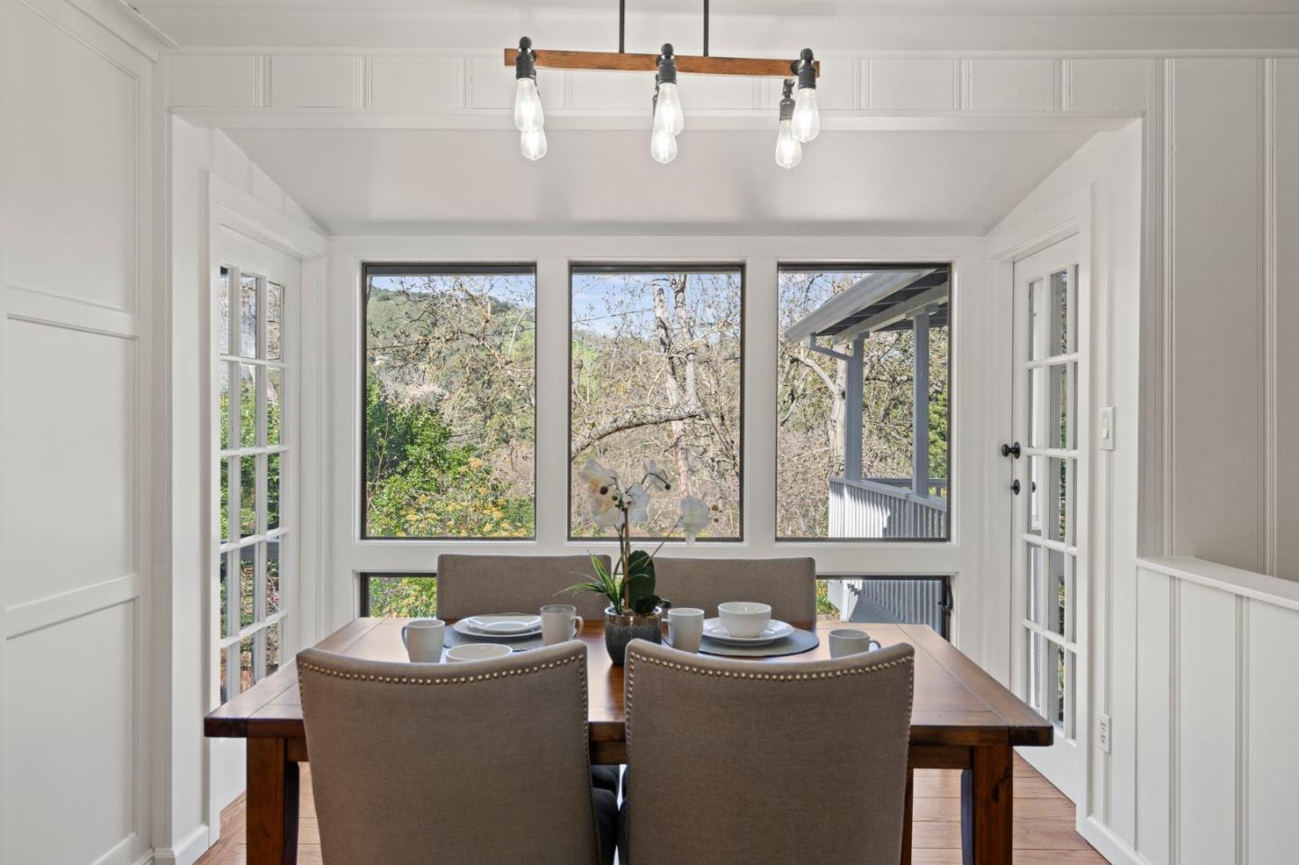 3368 Johnson Road Lafayette, CA 94549 - Photo 15 of 50 a dining room with a window and chandelier