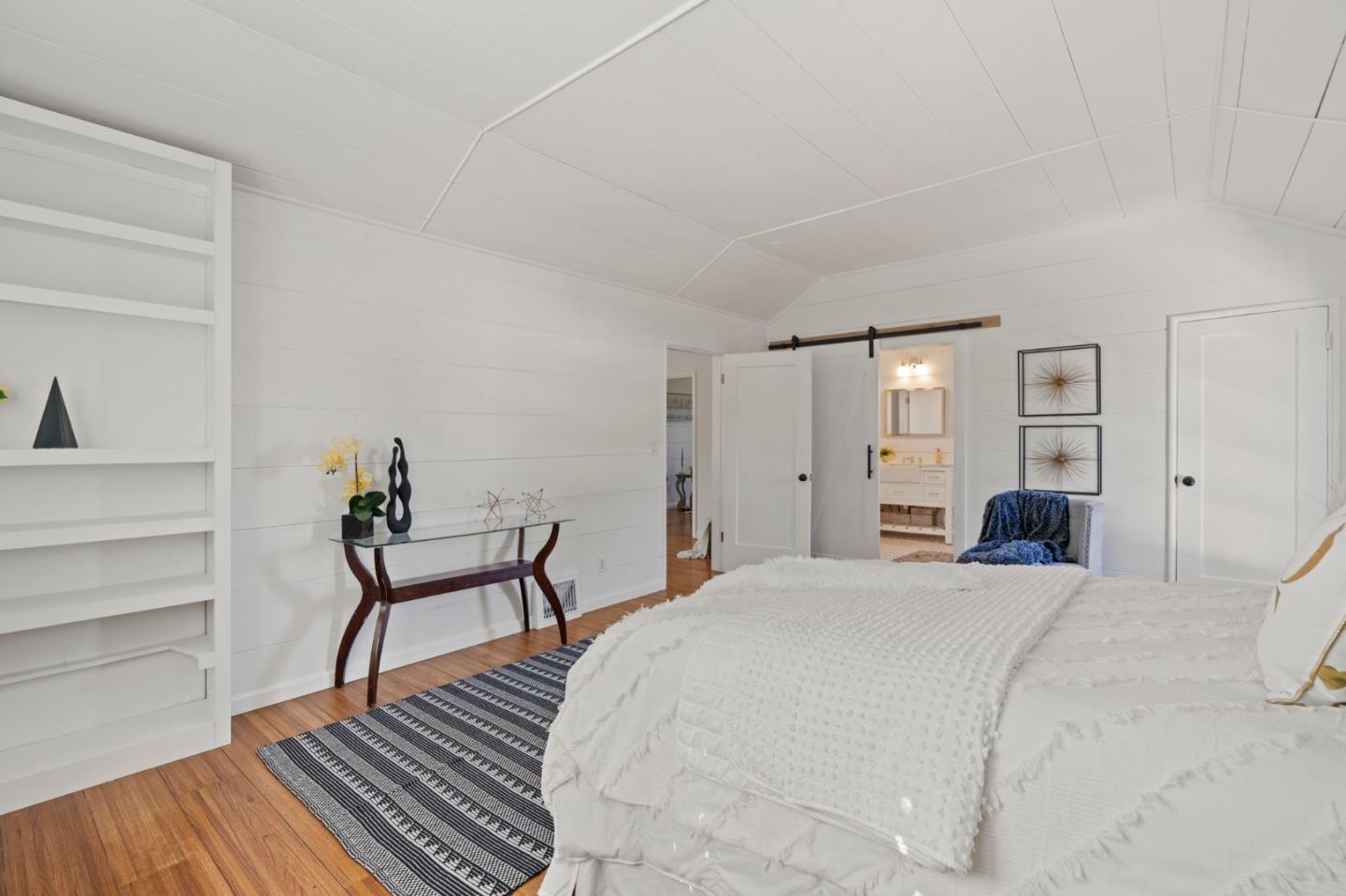 3368 Johnson Road Lafayette, CA 94549 - Photo 26 of 50 a bedroom with a bed and a table