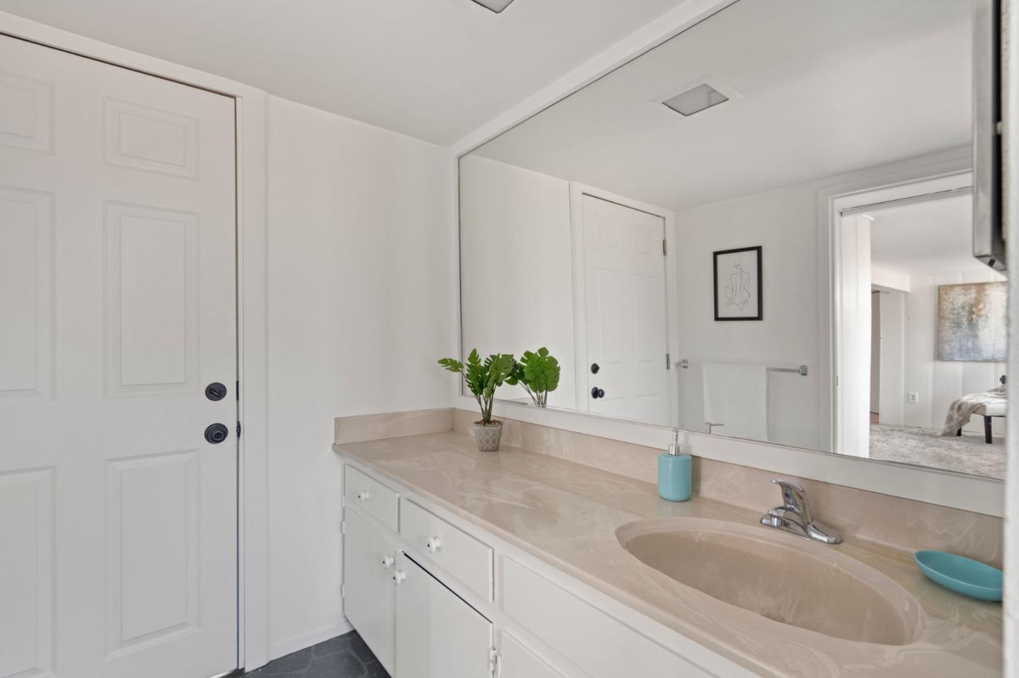 3368 Johnson Road Lafayette, CA 94549 - Photo 34 of 50 a bathroom with a granite countertop sink and a mirror