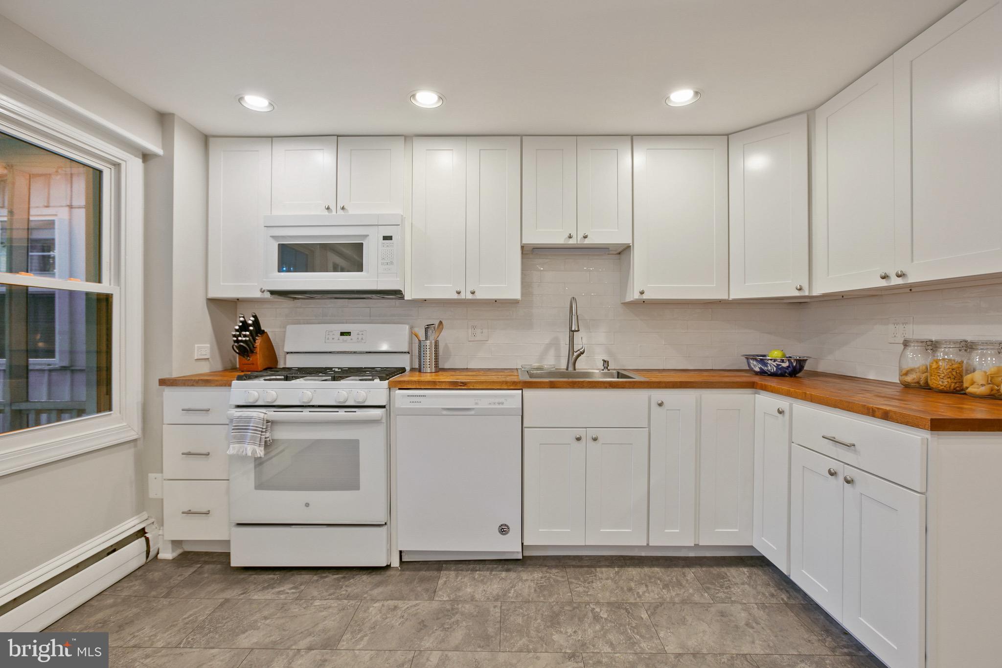 4514 Schenley Road Baltimore, MD 21210 - Photo 13 of 43 Newly Updated Kitchen with Butcher Block Counters